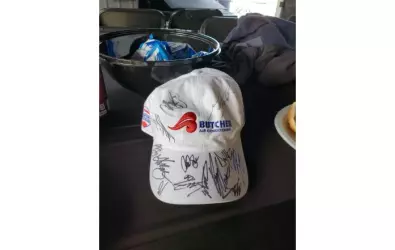 photo of a Butcher hat with autographs