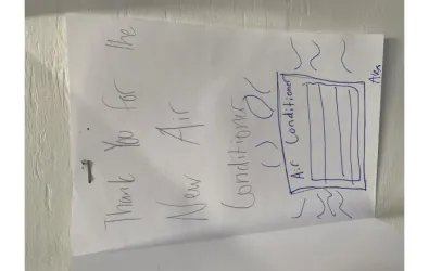Photo of a thank you note from a student for the AC services