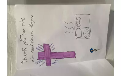Photo of a thank you note from a student for the AC services