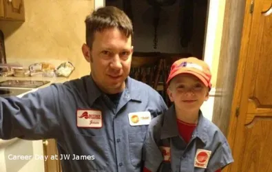 Photo of a father and son for career day supporting Butcher AC