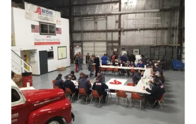 photo of employees celebrating Mr. Tom's 93rd birthday