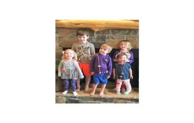 image of Butcher kids in front of fire place