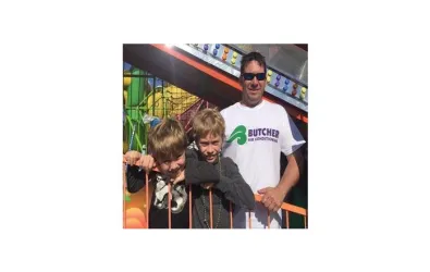 Butcher family at a Mardi Gras state fair