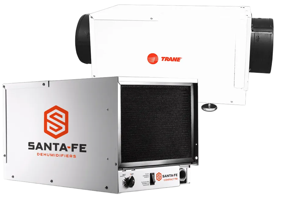 Santa-Fe Compact dehumidifier with open filter panel beside white Trane inline HVAC air handler